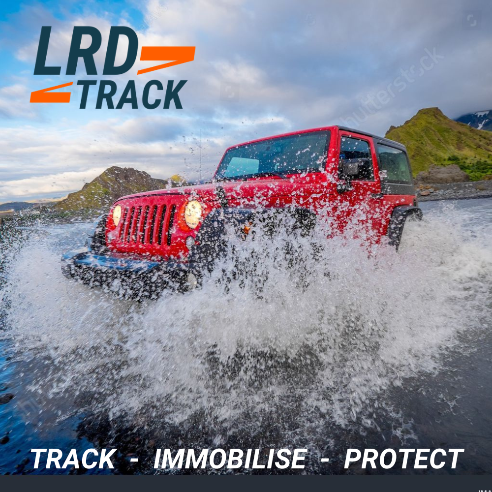 Red JEEP Splashing through a river